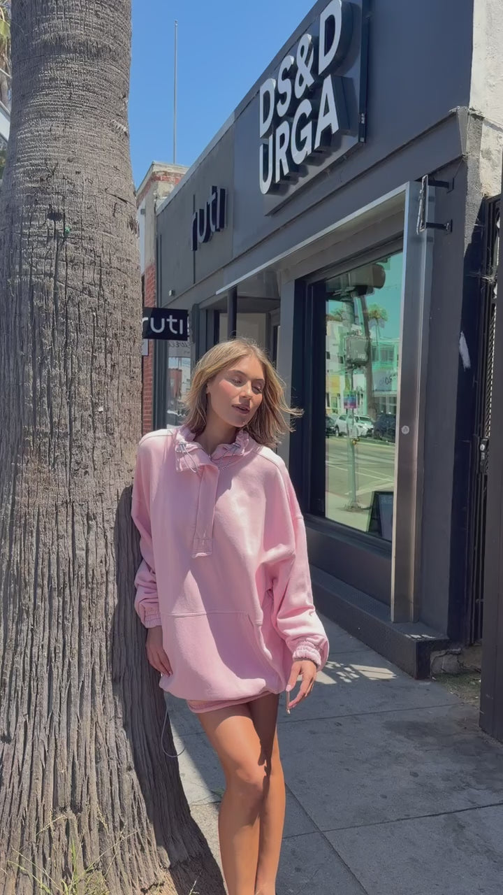 pink half zip sweater
